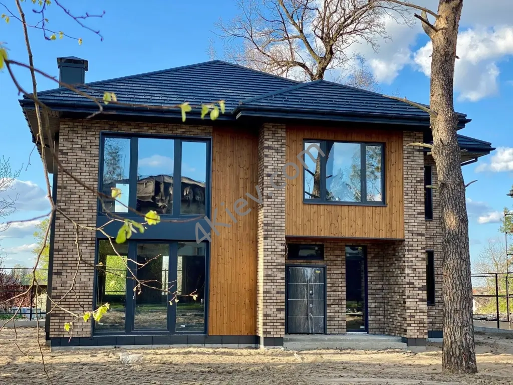 Cтильний двоповерховий будинок